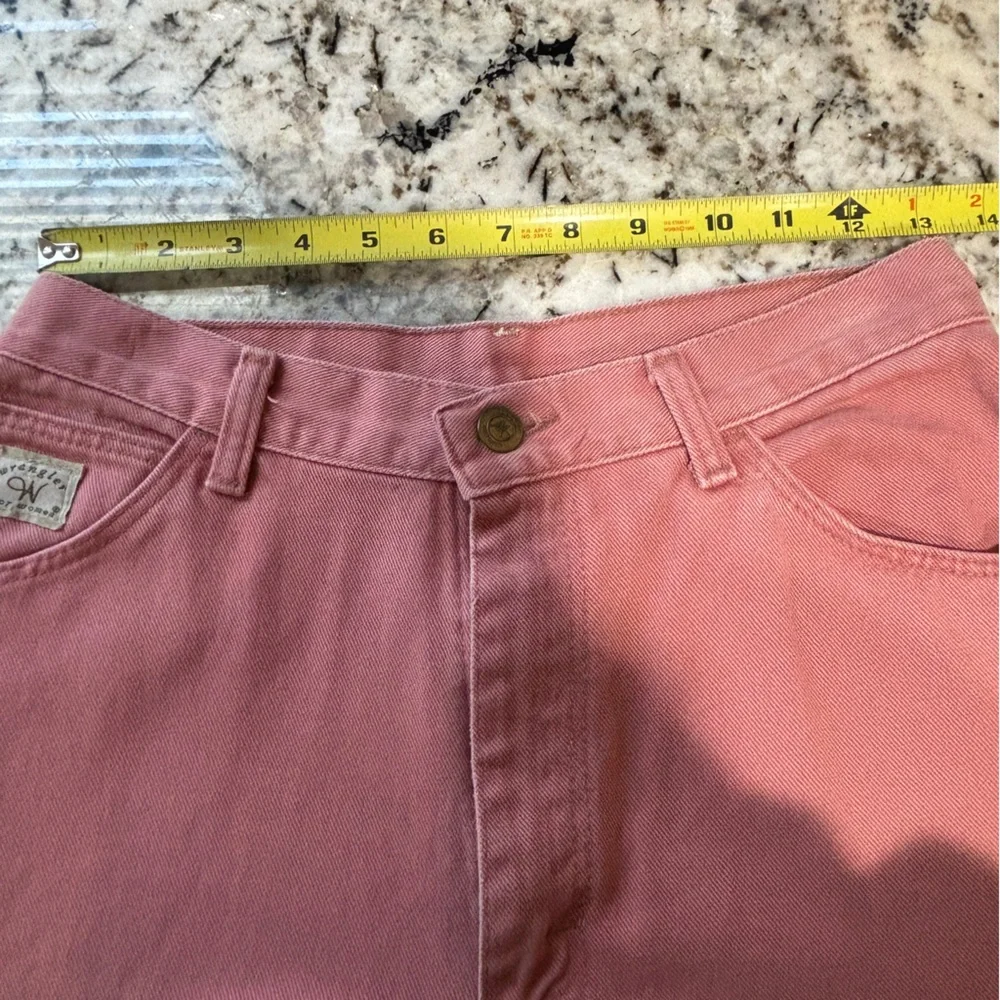 Wrangler pink jeans ‎ flat lay 13.5 inches waist